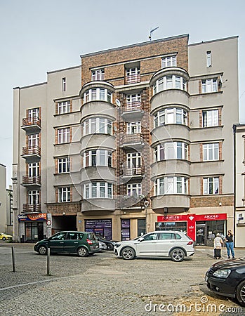 Old elegant modernistic prewar apartment house in BÄ™dzin, Poland driving Editorial Stock Photo