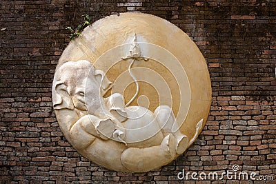 Old Elephants Statue on tha wall Stock Photo