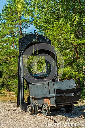 Old elevator cabin and mining train Stock Photo