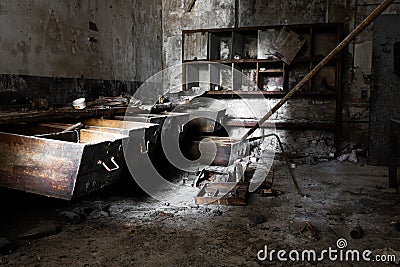 Old empty desolate dirty locksmith workshop Stock Photo