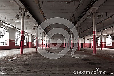 An old empty industrial warehouse interior Stock Photo