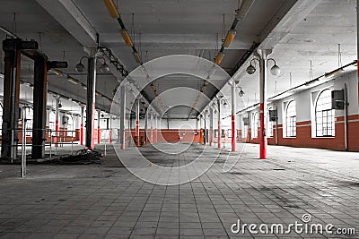 An old empty industrial warehouse interior Stock Photo