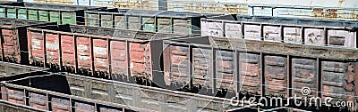 Old empty rusty train cars on rails in summer day Stock Photo