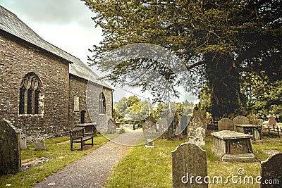 Old English churchyard and giant tree Landscape Stock Photo