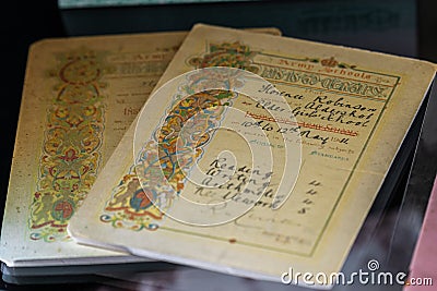 Old English School Report Card from 1911 written by a school inspector in the UK Editorial Stock Photo