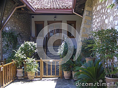 Old European courtyard. Historical Mediterranean Greek architecture. Stock Photo