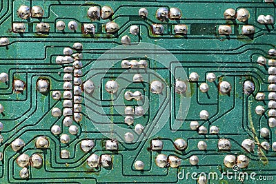 Old exposed green motherboard circuit Stock Photo