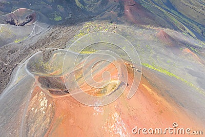 Old extinct inactive craters on the slope of the volcano Etna with tourist trails, aerial top view Stock Photo