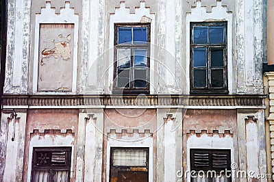 An old facade with many windows in vivid colors Stock Photo