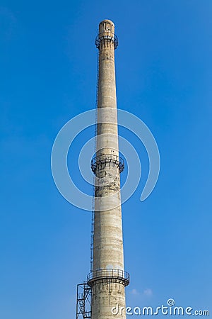 Old factory buildings and chimneys under blue sky Stock Photo