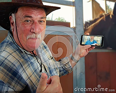 A rancher appreciated the benefits of telemedicine. Stock Photo