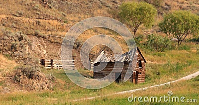 Old farmhouse in a field near Lillooet, British Columbia Stock Photo