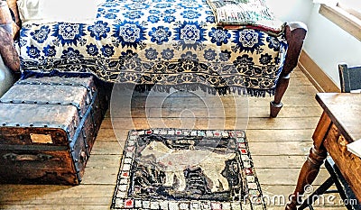 Old Fashioned Bedroom with Dog Rug Editorial Stock Photo