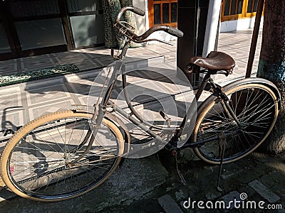 old-fashioned bicycles, brown like rusty, increasingly favored and sought after by hobbyists Stock Photo