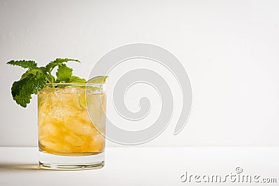 Old fashioned cocktail with lime and mint Stock Photo