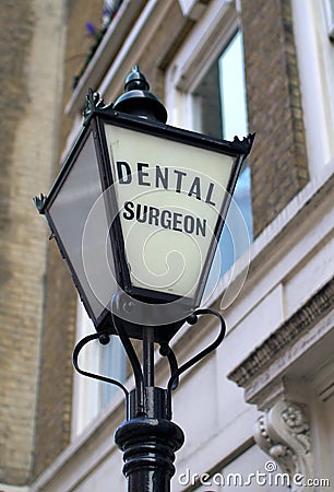 Old Fashioned Dentist Sign Stock Photo