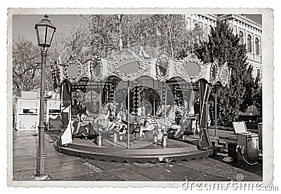 Old fashioned french carousel with horses Vintage photo Stock Photo