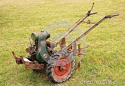 Old-fashioned garden tiller or rotovator Stock Photo