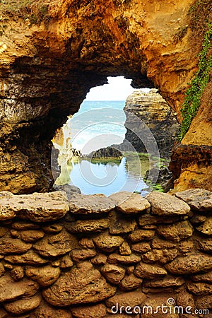Looking through coastal rock hole Stock Photo