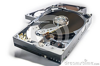 Old fashioned, open, mechanical harddisc drives, isolated on a white background Stock Photo