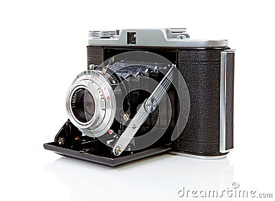 Old fashioned photo camera on white Stock Photo