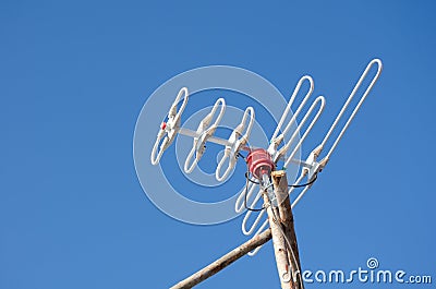 Old-fashioned radio antenna receiver set in rural wood. Stock Photo