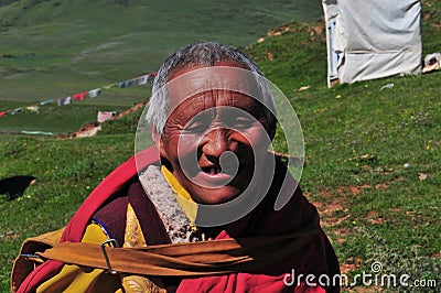 Old Female Monk in Tibet Editorial Stock Photo