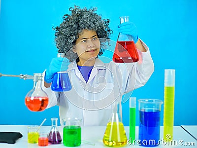 Old female scientist in research laboratory Stock Photo