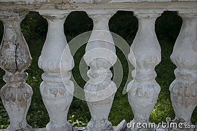 Old fence from the times of the USSR. Typical symbols of Soviet buildings. Stone background or texture Stock Photo