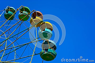 Old ferris wheel in a city park Stock Photo