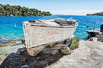 Old fishing boat with cracked white paint, Solta island, Croatia Stock Photo