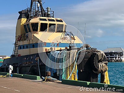 Old boat at a pier Stock Photo