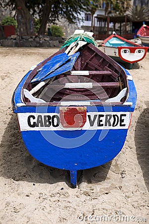 Old fishing boat on the shore. Boat with nets waiting for fishermen on the beach of Cape Verde Editorial Stock Photo