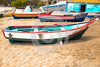 Old fishing boat on the shore. Boat with nets waiting for fishermen on the beach of Cape Verde Editorial Stock Photo