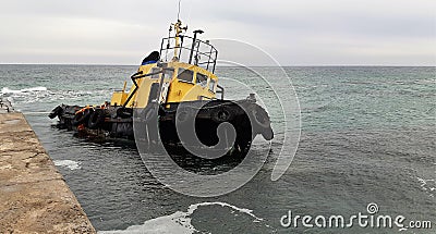 Old flooded towing ship. Shipwreck. Sunken towing ship Odessa Ukraine Editorial Stock Photo