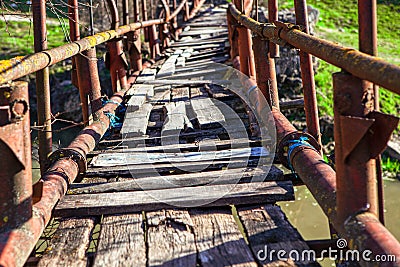 Old footbridge with balustrade Stock Photo