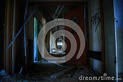 Crushed horror hallway in an abandoned decaying hospital in europe Stock Photo