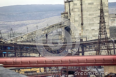 Old forties Copper-Nickel plant in smoke smoulder roof. Stock Photo