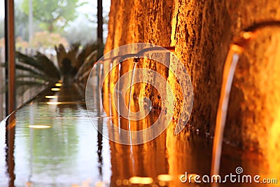 Old fountain at night, lit atmospherically Stock Photo