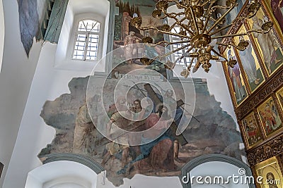 Old frescoes - ancient paintings of jesus christ on the inner walls of a temple or church after restoration Editorial Stock Photo