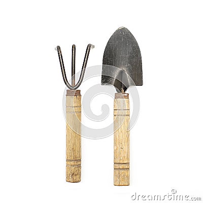 Old gardening tools spade and rake Stock Photo