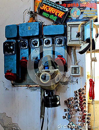 Old gas mask hanging on industrial attacks of electricity Editorial Stock Photo