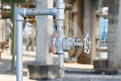 Old gate valve close industrial plant Stock Photo