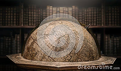 Old geographical globe in cabinet with bookselfs. Science, education, travel, vintage background. History and geography team. Stock Photo