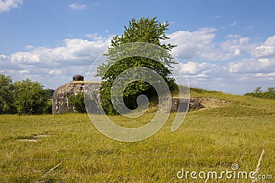 Old german bunker from the 2nd World War. A concrete bunker, abandoned in the fields in France Stock Photo