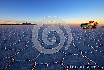 Old german vintage campervan on Salar de Uyuni, salt lake, Bolivia Stock Photo