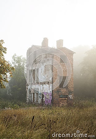 Old ghost house in a fog Stock Photo