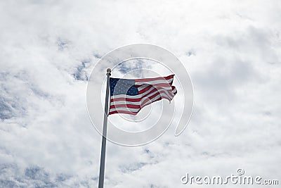 Old Glory flapping in the breeze Stock Photo