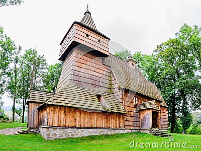 Old Gothic wooden church in Grywald village, Pieniny Mountains, Stock Photo
