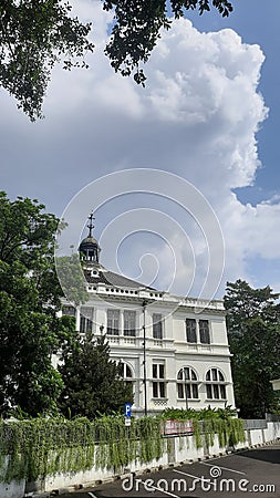 An old goverment building convert with leaves Editorial Stock Photo